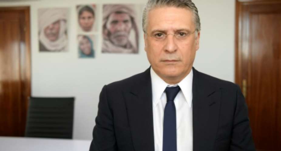 Tunisian presidential candidate Nabil Karoui, arrested on money laundering charges, is to stay behind bars after a third appeal for his release was turned down.  By FETHI BELAID AFPFile