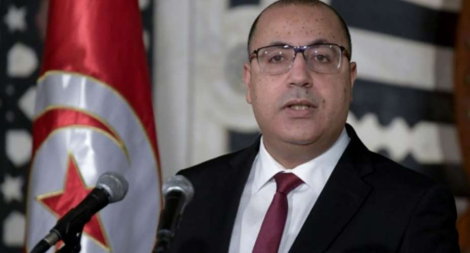 Tunisian Prime Minister Hichem Mechichi announced a cabinet reshuffle at a press conference in the capital Tunis.  By FETHI BELAID AFP