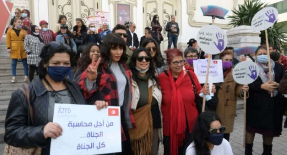 Tunisians demonstrated in the capital Tunis against violence against women ahead of International Women's Day this year.  By FETHI BELAID AFP