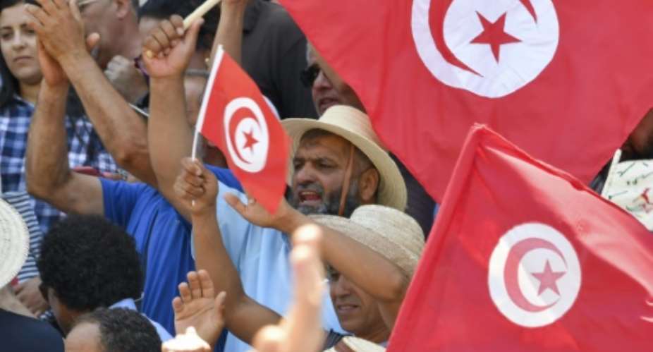 Tunisians in the capital Tunis protest on June 19, 2022 against President Kais Saied and the constitutional referendum to be held on July 25.  By FETHI BELAID AFPFile