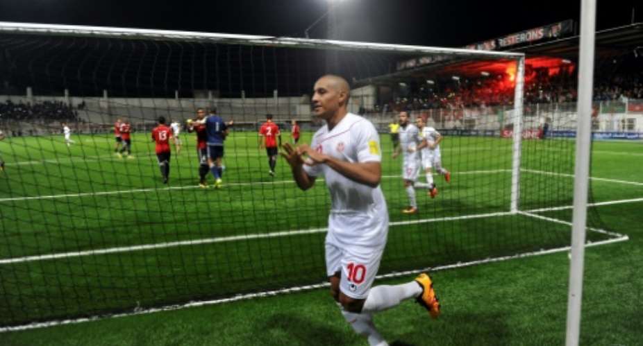 Tunisia's  khazri wahbi C celebrates after scoring a penalty during 2018 World Cup qualifying football match between Libya and Tunisia on November 11, 2016 i Algiers.  By RYAD KRAMDI AFPFile