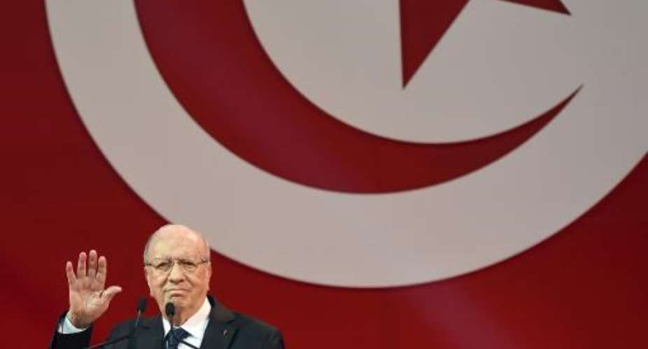 Beji Caid Essebsi, leader of Tunisia's main anti-Islamist Nidaa Tounes party and presidential candidate, gives a speech during a campaign meeting in Tunis on November 15, 2014.  By Fethi Belaid AFPFile