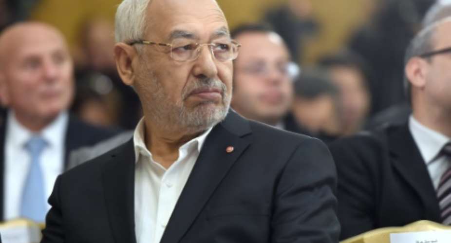 Tunisia's Ennahdha Islamist Party Leader Rached Ghannouchi looks on during a handover ceremony attended by the country's newly elected government in Tunis on February 6, 2015.  By Fethi Belaid AFPFile