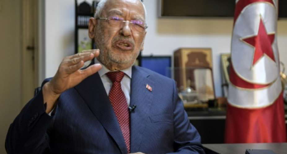 Tunisia's parliament speaker and head of the Islamist-inspired Ennahdha party Rached Ghannouchi is calling for a peaceful struggle against the president's power grab.  By FETHI BELAID AFP