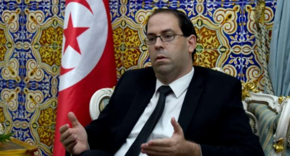 Tunisia's premier-designate Youssef Chahed said his 27-member cabinet would include eight women in important positions and 14 young ministers.  By Fethi Belaid AFPFile