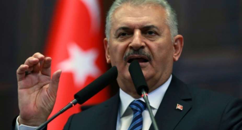 Turkish Prime Minister Binali Yildirim speaks during a meeting of his Turkish ruling Justice and Development Party AKP at the Grand National Assembly of Turkey TBMM in Ankara on August 9, 2016.  By Adem Altan AFPFile