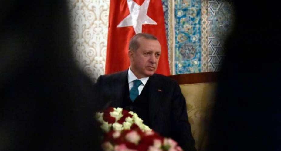 Turkish President Recep Tayyip Erdogan is undertaking a four-nation African tour to ramp up Turkey's growing influence throughout the continent.  By RYAD KRAMDI AFPFile