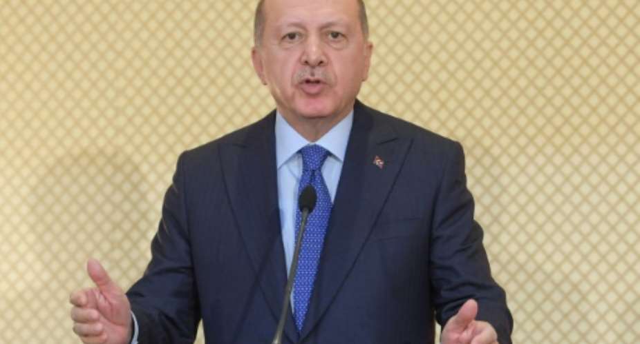 Turkish President Recep Tayyip Erdogan, pictured on December 25, 2019, said Turkish soldiers had begun deploying to Libya.  By FETHI BELAID AFPFile