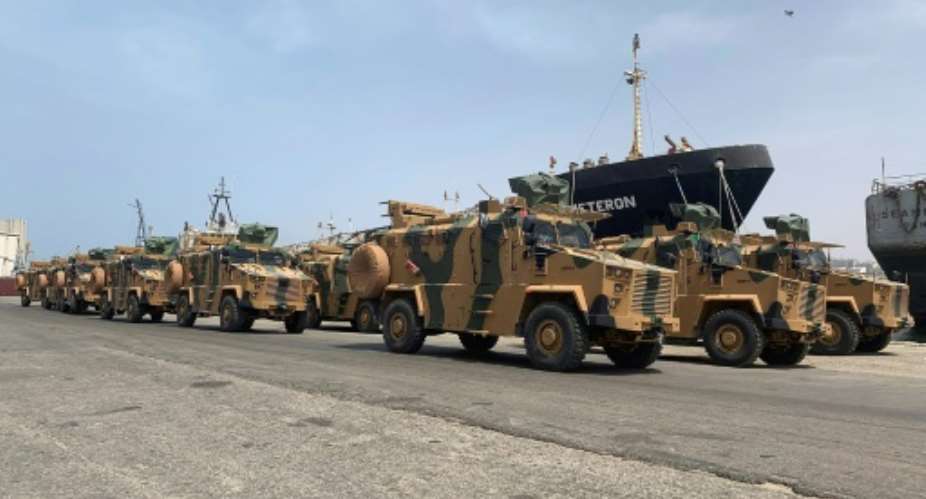 Turkish-built armoured vehicles unloaded at Tripoli port.  By - Media Bureau of Volcano of Anger operationAFP