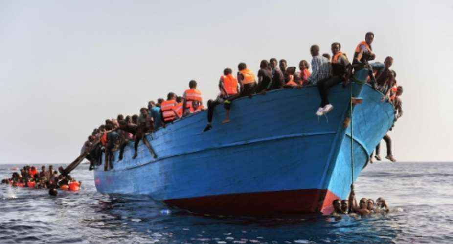 Turmoil exploited by people smugglers since the 2011 overthrow of Moamer Kadhafi has made Libya the main gateway for African migrants seeking to make dangerous Mediterranean crossings.  By ARIS MESSINIS AFPFile
