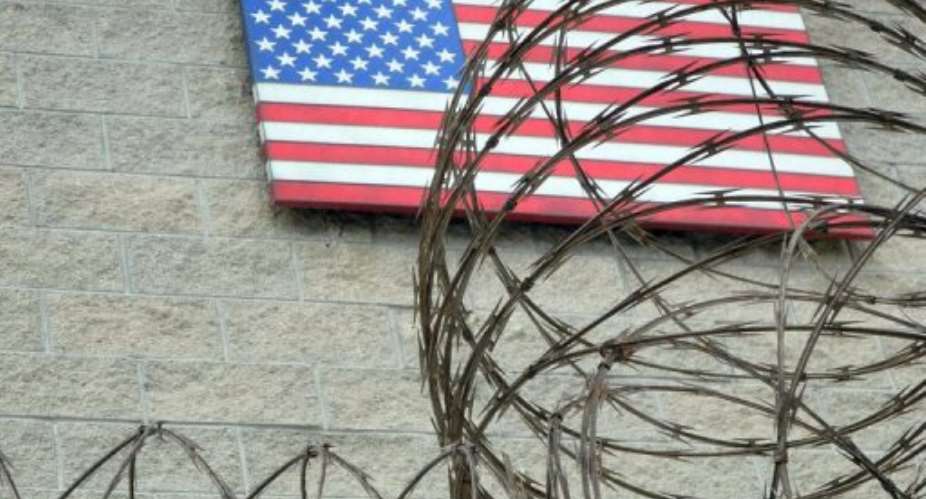 The US flag at the naval base in Guantanamo Bay, Cuba on August 7, 2013.  By Chantal Valery AFPFile