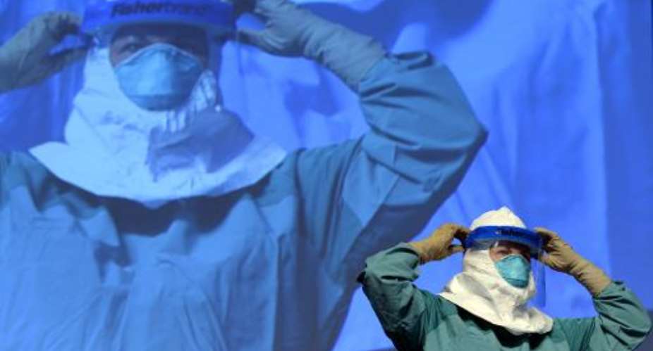 Two cured in US, Spain, as Ebola crisis widens