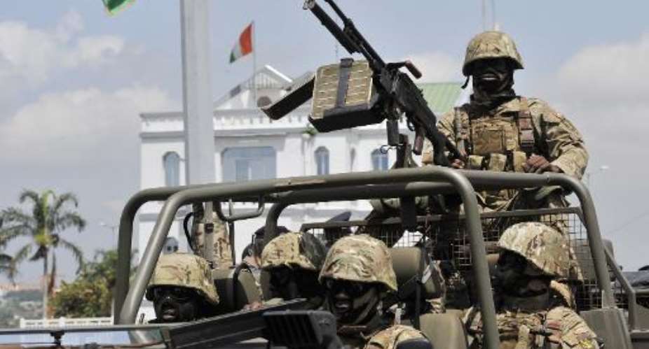 Ivory Coast soldiers at army headquarters in Abidjan on May 2, 2013.  By Issouf Sanogo AFPFile