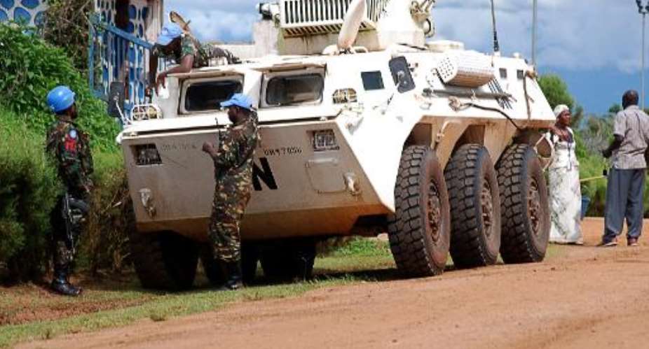 A UN MONUSCO armoured vehicle on patrol in Beni on October 23, 2014.  By Alain Wandimoyi AFPFile