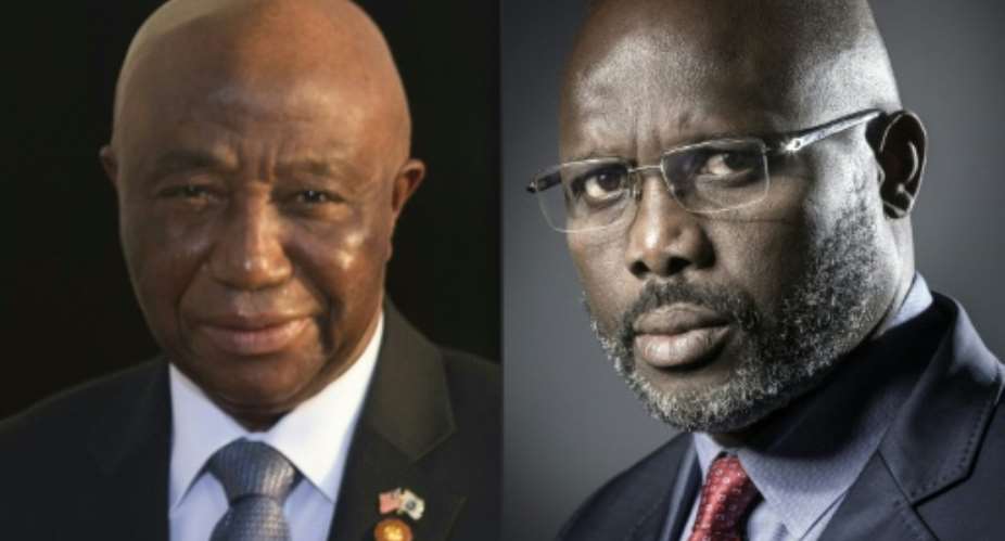 Two run-off rivals vie to lead Liberia in a poll on November 7. Incumbent Vice-President Joseph Boakai L and former star football George Weah were victors in the first round on October 10.  By JOEL SAGET, Brendan SMIALOWSKI AFPFile