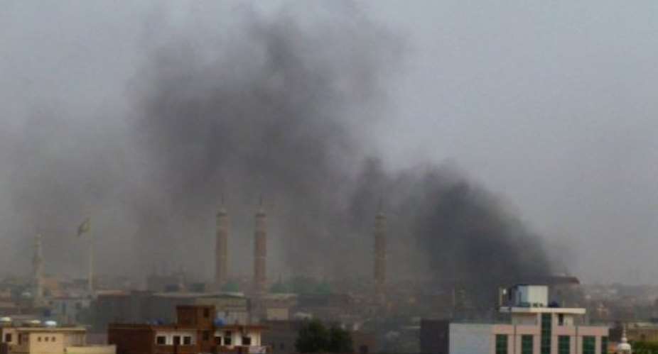 Smoke rises from protests in Khartoum on June 22.  By Ian Timbarlake (AFP/File)