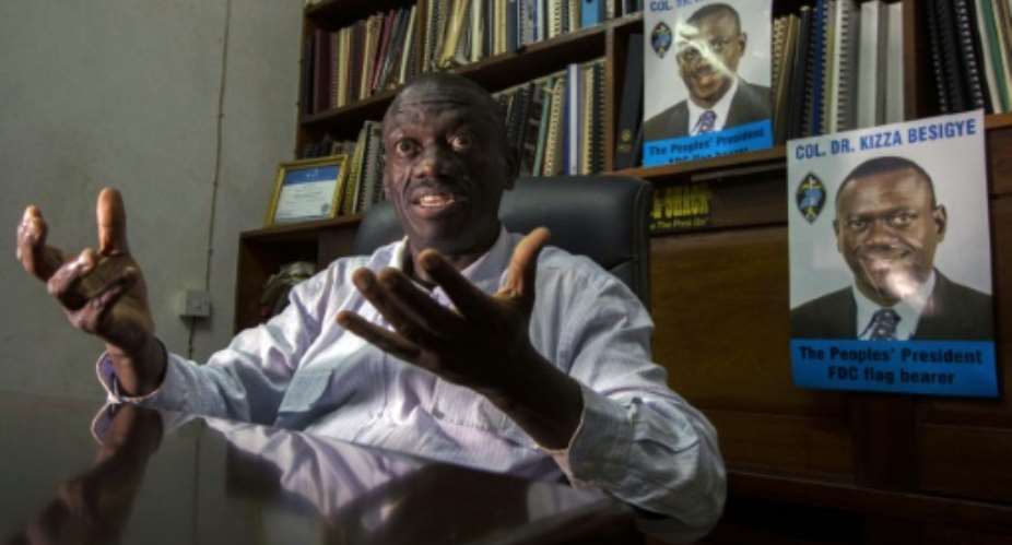 Kizza Besigye has told AFP in an interview in his office that he has had to challenge President Yoweri Museveni in order to see change in Uganda.  By Isaac Kasamani AFP