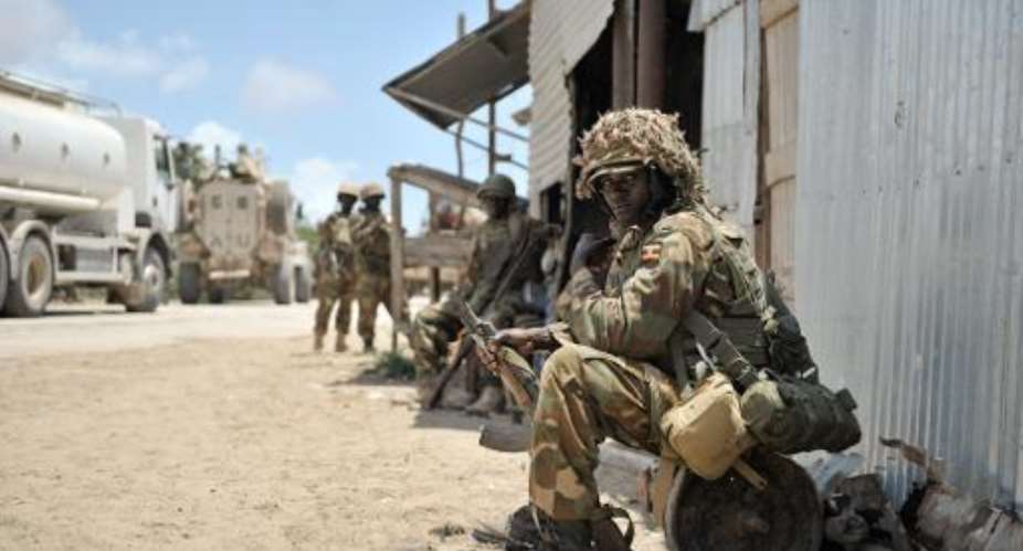 File image made available by the African Union Mission to Somalia AMISOM, shows a Ugandan soldier, belonging to AMISOM, resting in a small settlement six kilometers away from the Shebab stronghold of Barawe, in Somalia.  By Tobin Jones AMISOMAFPFile