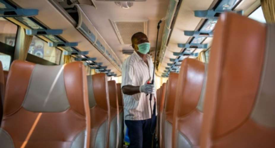 Uganda is battling to get citizens to comply with measures to curb the virus, with many new infections from public transport.  By Badru KATUMBA AFPFile