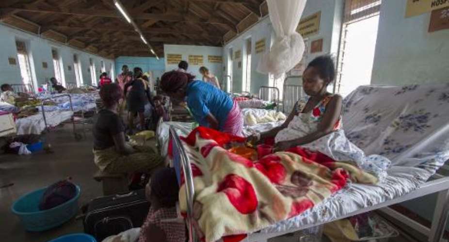 Patients wait in a ward prior to surgery at the Mulago Hospital in Kampala, Uganda on October 31, 2014.  By Isaac Kasamani AFPFile