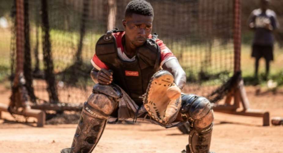 Ugandan baseball player Dennis Kasumba, 18, has been invited to the Major League Baseball Draft League in the United States.  By Badru Katumba AFP