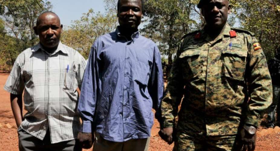 Lord's Resistance Army LRA commander Dominic Ongwen  centre was arrested in 2015.  By - Uganda People's Defense ForceAFPFile