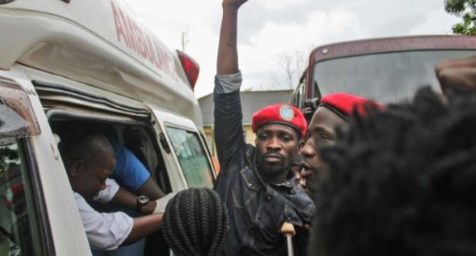 Ugandan singer-turned-politician Robert Kyagulanyi says security officers beat him.  By Stringer AFPFile
