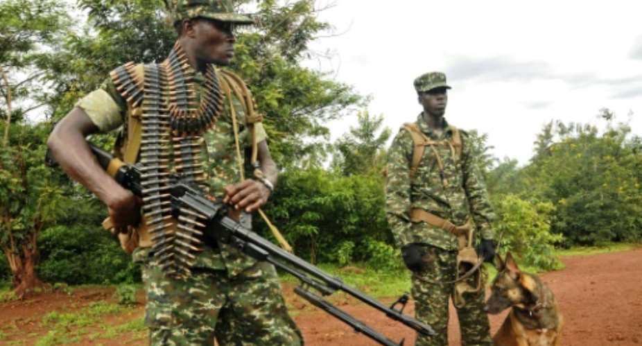 Uganda's army said it had launched attacks on a shadowy rebel group in the eastern Democratic Republic of Congo, where the militants killed 14 UN peacekeepers earlier this month.  By STRINGER AFPFile