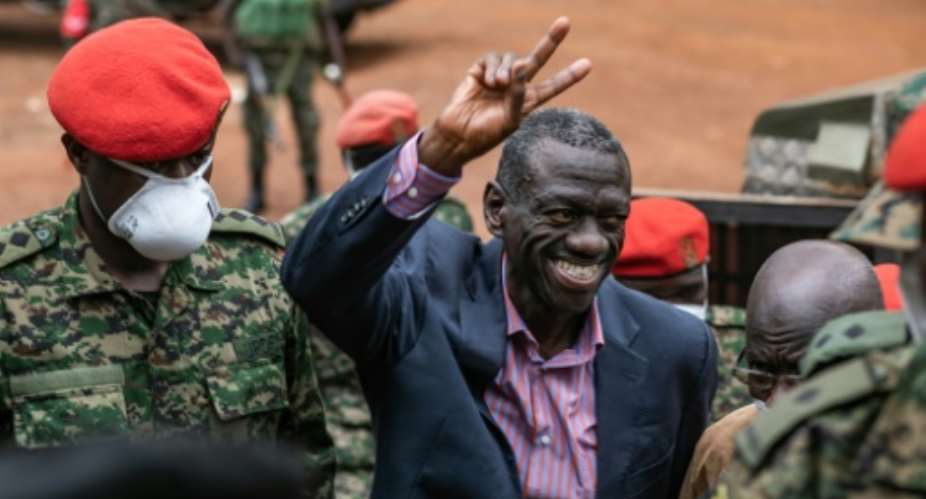 Ugandas veteran opposition figure Kizza Besigye is charged with treason.  By Badru Katumba (AFP/File)