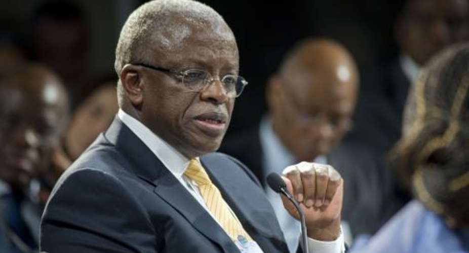 Amama Mbabazi gives a speech during the World Economic Forum Meeting on Africa in Cape Town on May 9, 2013, in Cape Town.  By Rodger Bosch AFP