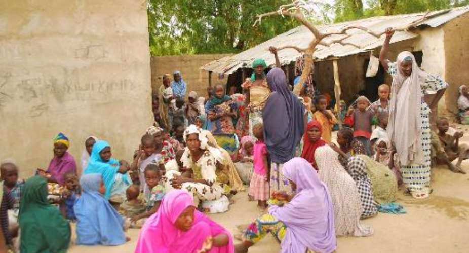 Women and children who were rescued in a Nigerian military operation against Boko Haram militants in the Sambisa Forest, Borno state, on April 30, 2015.  By  Nigerian armyAFPFile