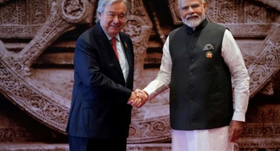 UN chief Antonio Guterres (L, with Indian Prime Minister Narendra Modi) has warned of growing global divisions.  By Evan Vucci (POOL/AFP)