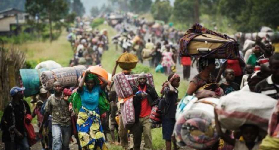 People flee Sake, west of Goma, on November 22, 2012.  By Phil Moore (AFP/File)