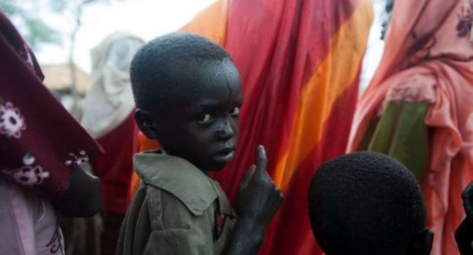 Young refugees from Blue Nile state arrive at Yusuf Batil Refugee in June 2012.  By Giulio Petrocco AFP