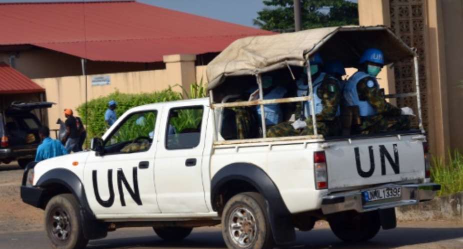 Soldiers of the United Nations Mission in Liberia UNMIL patrol polling stations in Monrovia during parliamentary elections on December 20, 2014.  By Zoom Dosso AFPFile