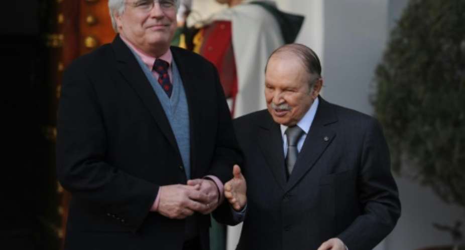 UN envoy on the Western Sahara Christopher Ross L is pictured with Algerian President Abdelaziz Bouteflika in Algiers on April 1, 2013.  By Farouk Batiche AFPFile