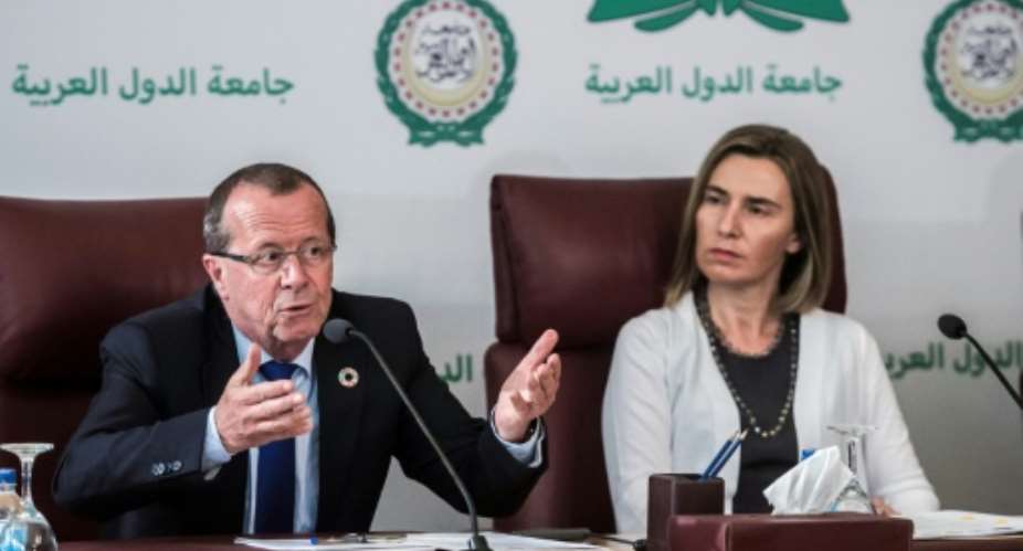 UN envoy Martin Kobler and EU foreign policy chief Federica Mogherini pledge their support to Libya's unity government during talks at the Arab League headquarters in Cairo, on March 18, 2017.  By KHALED DESOUKI AFP