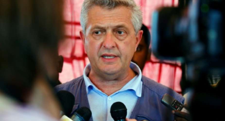 UN High Commissioner for Refugees Filippo Grandi talks to journalists on August 15, 2017, as he visits the Al-Nimir camp in the Sudanese state of East Darfur for an on-the-ground assessment of the situation of South Sudanese refugees living in Sudan.  By ASHRAF SHAZLY AFP