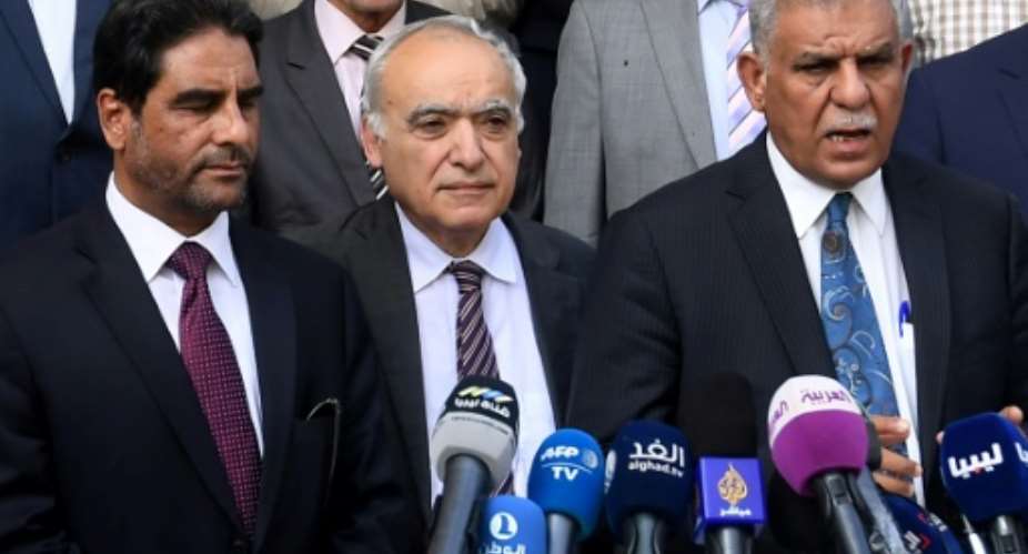 UN Libya envoy Ghassan Salame C and representatives of the country's rival administrations speak to reporters on October 1, 2017.  By FETHI BELAID AFP