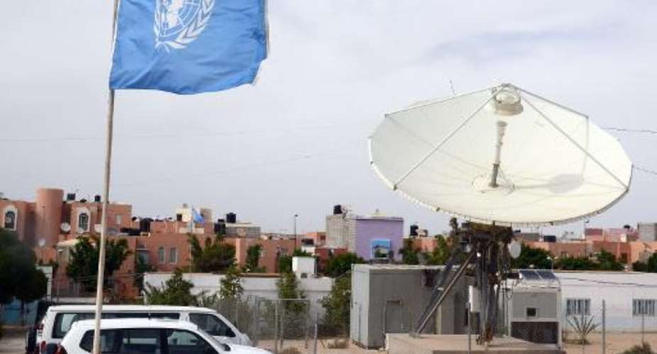 UN vehicles parked outside the headquarters of MINURSO on May 13, 2013 in Laayoune.  By Fadel Senna AFPFile