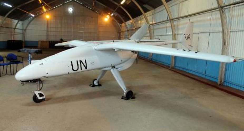 A surveillance drone belonging to the UN's peacekeeping mission in the Democratic Republic of Congo sits in a hangar in the city of Goma on December 3, 2013.  By  AFPFile