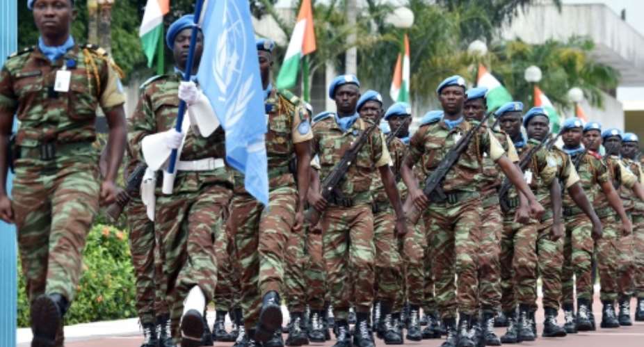 United Nations peacekeepers parade in Abidjan, on August 7, 2015.  By Issouf Sanogo AFPFile