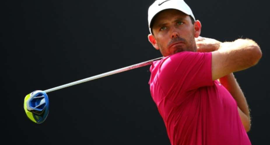 South Africa's Charl Schwartzel tees off during the DP World Tour Golf Championship in Dubai, on November 21, 2015.  By Marwan Naamani AFPFile