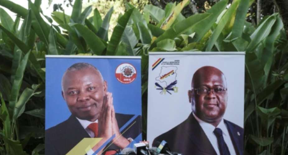 Under their agreement, DR Congo opposition leader Felix Tshisekedi, seen on the right, will run for president with Vital Kamerhe as his running mate.  By Yasuyoshi CHIBA AFP