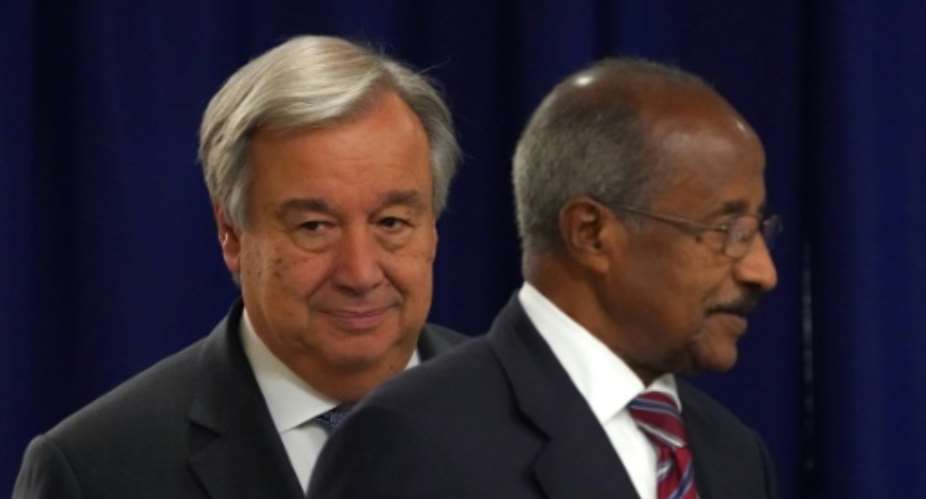 United Nations Secretary General Antonio Guterres L meets with Eritrea's Minister for Foreign Affairs Osman Saleh Mohammed at the United Nations in New York on September 27, 2018. Eritrea's foreign minister on Saturday called for sanctions against his country to be lifted as a result of the peace deal with Ethiopia.  By Don EMMERT AFP
