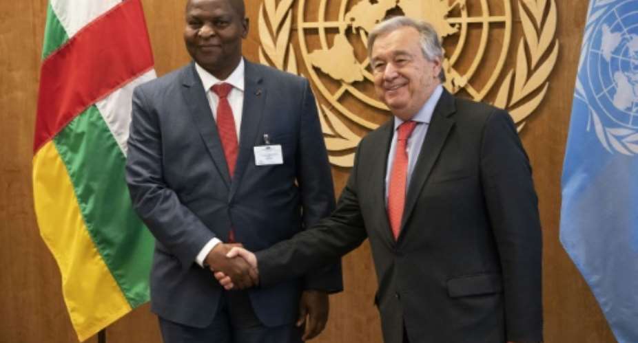 United Nations Secretary General Antonio Guterres R greets Faustin Archange Touadera, President, Central African Republic at the United Nations in New York on September 23, 2018.  By DON EMMERT AFPFile