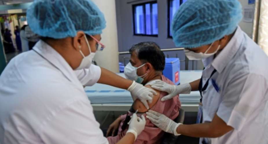 Until vaccines are fully rolled out, countries have few options but to rely on lockdown restrictions to curb the spread of the virus.  By Sam PANTHAKY AFPFile