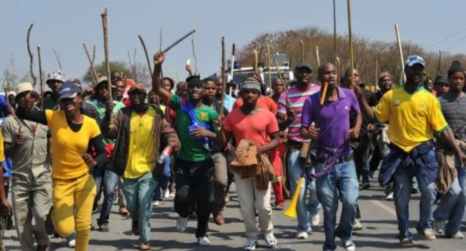 Striking Anglo American Platinum (Amplats) workers in Rustenburg on September 12, 2012.  By Alexander Joe (AFP/File)