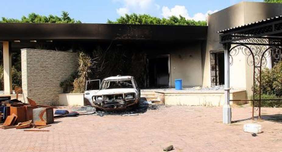 A burnt house and a car are seen inside the US Embassy compound on September 12, 2012 in Benghazi, Libya, following an overnight attack on the building.  By  AFPFile