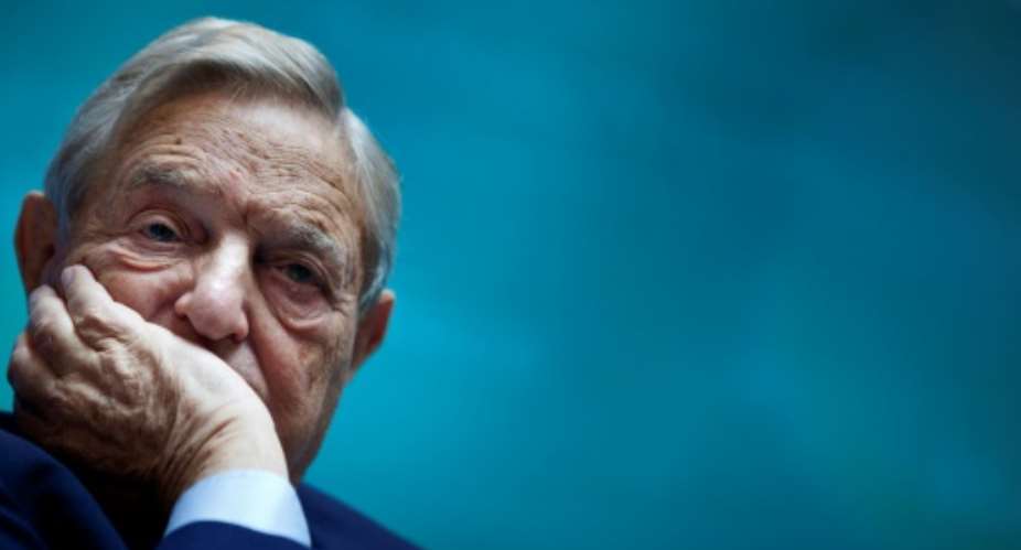 US billionaire George Soros, seen here in 2011, was allegedly involved in efforts to overthrow the president of Equatorial Guinea, a former British mercenary has told a Paris court.  By BRENDAN SMIALOWSKI AFPFile